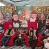 Scholars and reciters seated at an annual urs gathering, with naat being recited to the congregation
