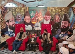 Scholars and reciters seated at an annual urs gathering, with naat being recited to the congregation