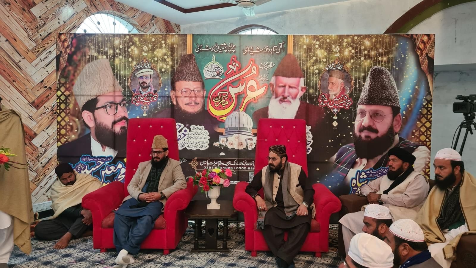 Scholars and reciters seated at an annual urs gathering, with naat being recited to the congregation