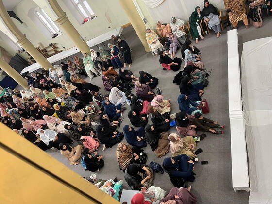 Community gathering in the main hall