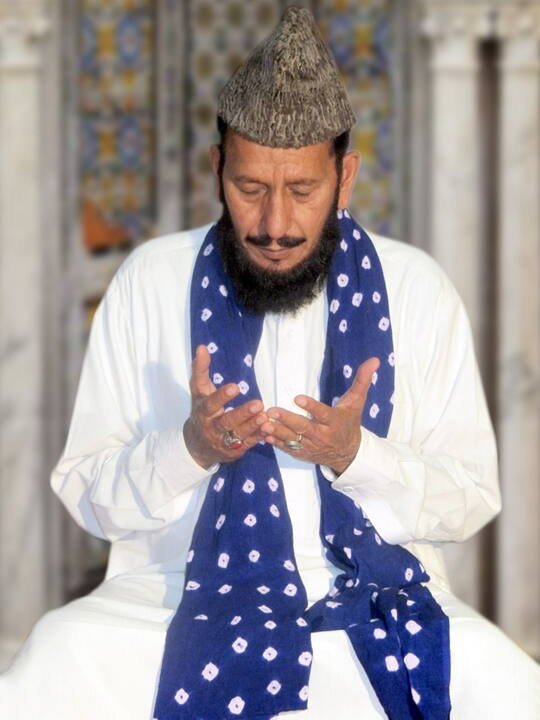 Dua at a Giyarhwin Sharif gathering, BKM Community Group Manchester