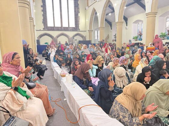 Large community gathering at BKM Community