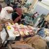 Community members sharing a meal together at a BKM Community gathering in Manchester