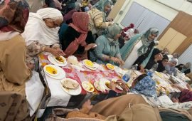 Community members sharing a meal together